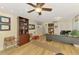 Large home office with hardwood floors and plenty of space for work and relaxation at 400 Nokomis S Ave, Venice, FL 34285