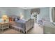 Charming bedroom with wicker furniture, creating a cozy and inviting atmosphere at 4002 Las Palmas Way, Sarasota, FL 34238