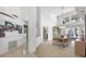 Elegant dining area featuring modern light fixture and large windows for natural light and golf views at 4002 Las Palmas Way, Sarasota, FL 34238