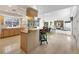 Kitchen with breakfast bar and open view to living room, perfect for cooking and entertaining at 4002 Las Palmas Way, Sarasota, FL 34238