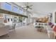 A spacious living room with views of the patio, creating a seamless indoor-outdoor living experience at 4002 Las Palmas Way, Sarasota, FL 34238