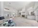 Expansive living room with a fireplace, high ceilings, and contemporary decor and great flow at 4002 Las Palmas Way, Sarasota, FL 34238