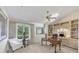 Bright office space featuring a large window, built-in shelving, and a traditional desk at 4002 Las Palmas Way, Sarasota, FL 34238