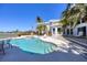 Stunning pool and spa are surrounded by lush tropical landscaping at 4002 Las Palmas Way, Sarasota, FL 34238