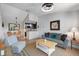 Comfortable living room with open layout, modern furnishings, and seamless flow to the kitchen and dining areas at 4009 Crockers Lake Blvd # 25, Sarasota, FL 34238