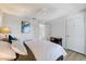 Cozy bedroom with a comfortable bed, soothing color palette, and ample closet space at 4009 Crockers Lake Blvd # 25, Sarasota, FL 34238