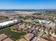 Overhead view of the community and house with surrounding lake, close to shops, schools, and I-75 at 4015 Bridlecrest Ln, Bradenton, FL 34209