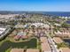 A beautiful aerial view of the homes shows them nestled on the landscape near Sarasota Bay at 4015 Bridlecrest Ln, Bradenton, FL 34209
