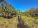 Natural creek view showcases lush greenery, enhancing the serene community setting at 4015 Bridlecrest Ln, Bradenton, FL 34209
