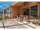 Enjoy scenic views from this screened-in patio, perfect for entertaining or relaxing at 4015 Bridlecrest Ln, Bradenton, FL 34209