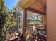 Tranquil screened lanai provides a serene outdoor experience, enhanced by the lake views at 4015 Bridlecrest Ln, Bradenton, FL 34209