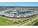 Stunning aerial view of the community showcasing lakefront homes and lush landscaping at 4629 Antrim Dr, Sarasota, FL 34240