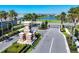 Inviting entrance to a gated community with lush landscaping and elegant signage at 4629 Antrim Dr, Sarasota, FL 34240
