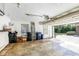 Spacious garage with high ceilings and natural light, offering ample room for parking and storage at 4942 Hidden Oaks Ln, Sarasota, FL 34232