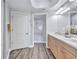 Well-lit bathroom with double vanity, and a glass-enclosed shower at 501 Haben Blvd # 202, Palmetto, FL 34221