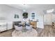 Elegant dining area featuring a glass table, stylish seating, and attractive decor at 501 Haben Blvd # 202, Palmetto, FL 34221