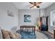 Office featuring a large wooden desk, modern art and comfortable seating at 501 Haben Blvd # 202, Palmetto, FL 34221
