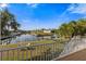 Backyard overlooking the water with boat dock at 504 59Th St, Holmes Beach, FL 34217