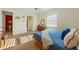 Bright bedroom with hardwood floors, ceiling fan, and natural light at 504 59Th St, Holmes Beach, FL 34217