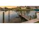 View of private boat dock along waterway at 504 59Th St, Holmes Beach, FL 34217