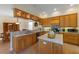 Spacious kitchen with light wood cabinets, stainless appliances, and lots of space for prepping delicious meals at 504 59Th St, Holmes Beach, FL 34217