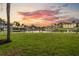 Picturesque waterfront property with boat docks and stunning sunset views over the tranquil waterway at 504 59Th St, Holmes Beach, FL 34217