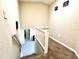 Second story hallway featuring access to bedrooms and stairwell at 5104 Silver Bell Dr, Port Charlotte, FL 33948