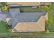 Drone shot of house roof with landscaping at 5203 Rushmere Ct, Palmetto, FL 34221