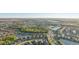 Expansive aerial view of the community highlighting ponds, lush landscaping, and well-planned streets at 5203 Rushmere Ct, Palmetto, FL 34221