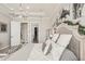 Lovely main bedroom with gray decor, an ensuite closet, and neutral carpet at 5203 Rushmere Ct, Palmetto, FL 34221