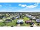 This aerial image showcases the house and property lines in a residential area at 566 Corrientes Cir, Punta Gorda, FL 33983