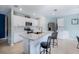 Well-equipped kitchen with a center island, stainless steel appliances, and ample cabinet space at 566 Corrientes Cir, Punta Gorda, FL 33983