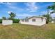This property features a well-maintained lawn, and a storage shed, providing extra storage space at 610 Cumberland Rd, Venice, FL 34293