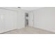 Bright bedroom with closet space and an open entryway to another room at 610 Cumberland Rd, Venice, FL 34293