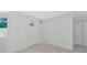 Bright entryway with a decorative glass front door and wood-look flooring at 610 Cumberland Rd, Venice, FL 34293