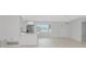 Bright, open living space featuring modern flooring and seamlessly connects to the kitchen at 610 Cumberland Rd, Venice, FL 34293