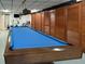 Recreational room with a billiards table, seating, and exercise equipment for resident enjoyment at 6125 Coral Way, Bradenton, FL 34207
