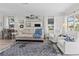 Bright living room with large windows offering plenty of natural light at 6125 Coral Way, Bradenton, FL 34207