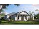 Charming single story home with front porch, grey roof, white siding, black trim, and landscaped front yard at 6137 Grove Blvd, Punta Gorda, FL 33982