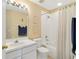 Bright bathroom featuring a shower-tub combo, fresh paint, and updated vanity at 6320 Rosefinch Ct # 101, Lakewood Ranch, FL 34202