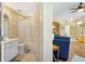 Inviting bathroom featuring a shower-tub combo, tile floors, and neutral paint at 6320 Rosefinch Ct # 101, Lakewood Ranch, FL 34202