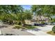 Desirable condo community with mature trees and convenient parking, offering a comfortable lifestyle at 6320 Rosefinch Ct # 101, Lakewood Ranch, FL 34202