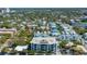 Scenic aerial view of the building nestled within a lush residential neighborhood at 635 S Orange Ave # 404, Sarasota, FL 34236