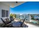 Outdoor balcony with stylish seating and city views, perfect for entertaining at 635 S Orange Ave # 404, Sarasota, FL 34236