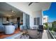 Balcony with seating offering views of the city, and indoor-outdoor living at 635 S Orange Ave # 404, Sarasota, FL 34236
