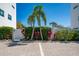 Exterior of a unit showing landscaping and parking at 635 S Orange Ave # 404, Sarasota, FL 34236
