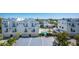 Community featuring well-manicured landscaping, a pool, and parking at 635 S Orange Ave # 404, Sarasota, FL 34236