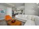 Spacious living room features a comfortable white sofa, modern decor, and an open layout at 635 S Orange Ave # 404, Sarasota, FL 34236