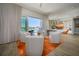 Inviting living area with sliding doors to a balcony offering expansive views at 635 S Orange Ave # 404, Sarasota, FL 34236