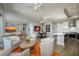 Bright living room with modern furnishings, dining area and open access to a modern kitchen at 635 S Orange Ave # 404, Sarasota, FL 34236